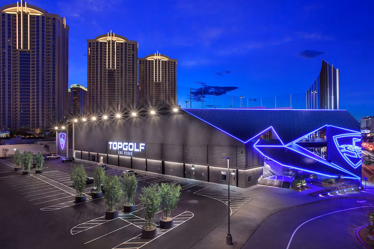 Topgolf bay overlooking the Las Vegas skyline at night